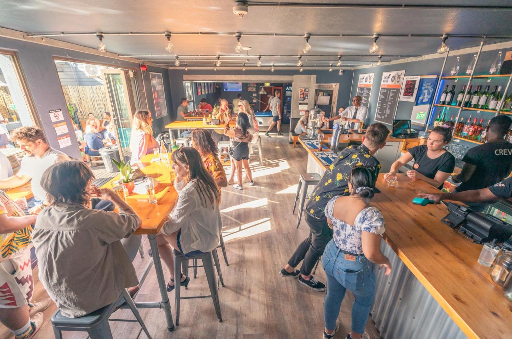 Never At Home Green Point Cape Town Eksteriør bilde The interior of the bar